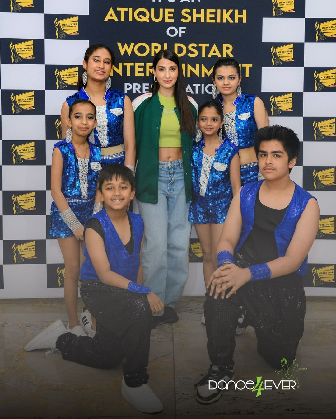 Dance4Ever kids team with Nora Fatehi at a World Star event