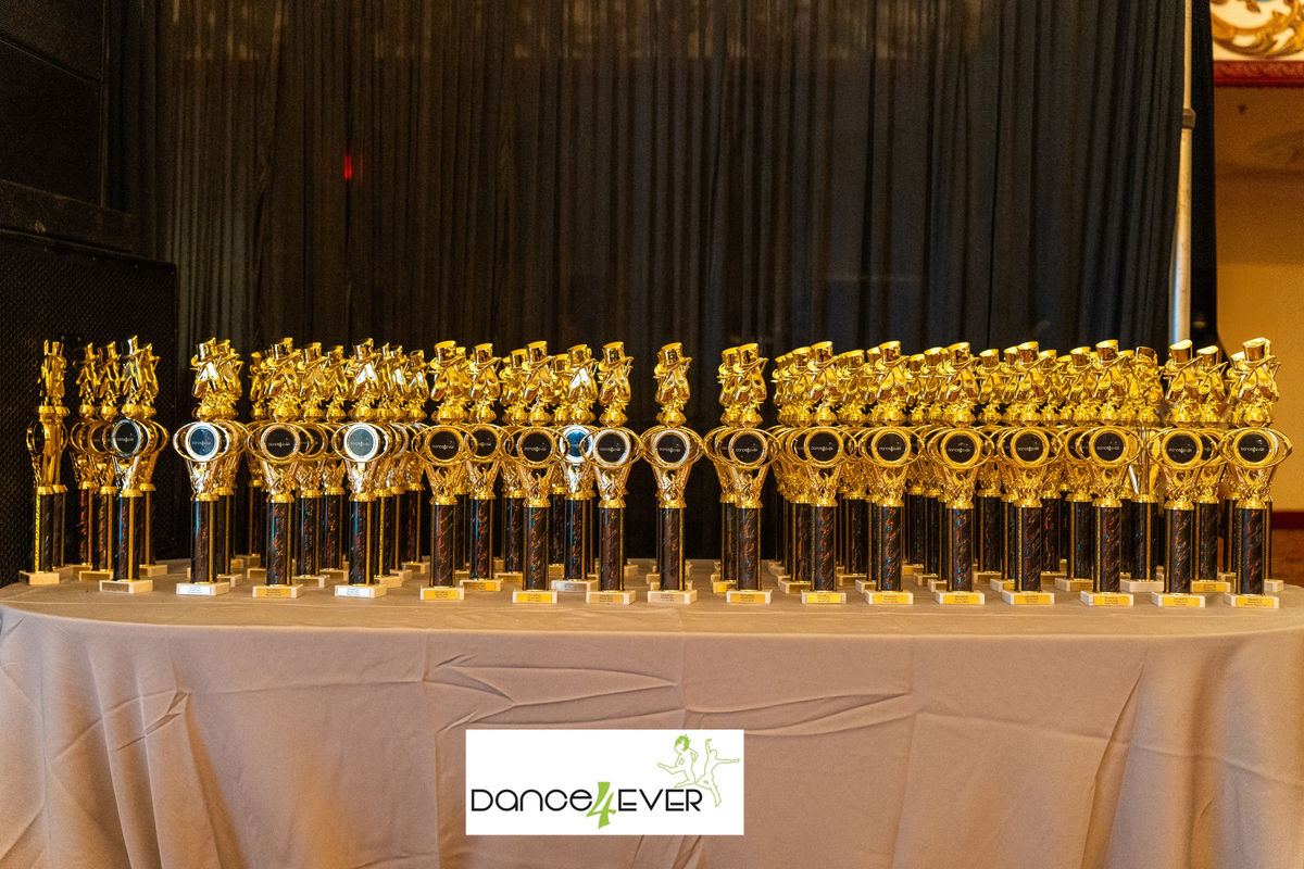 A table full of trophies before the award ceremony